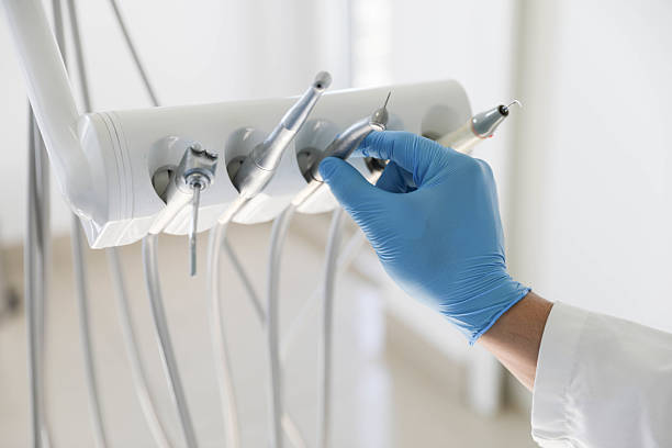 Professional Tooth Extraction technician working in McComb, MS